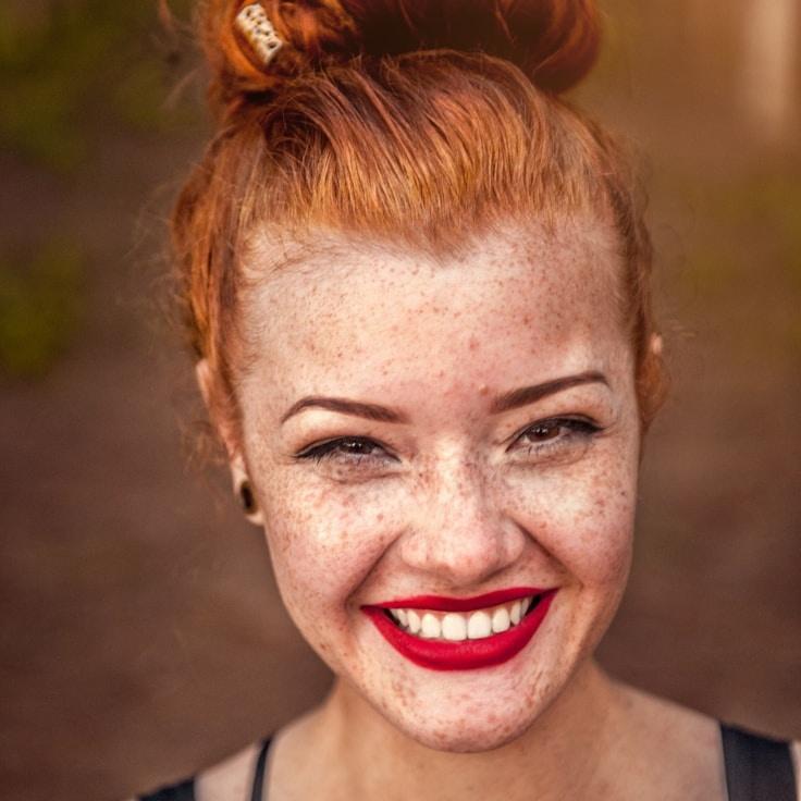 Alex Chen, Lead Design Curator at SummitModernPlain, reviewing corporate floral arrangements